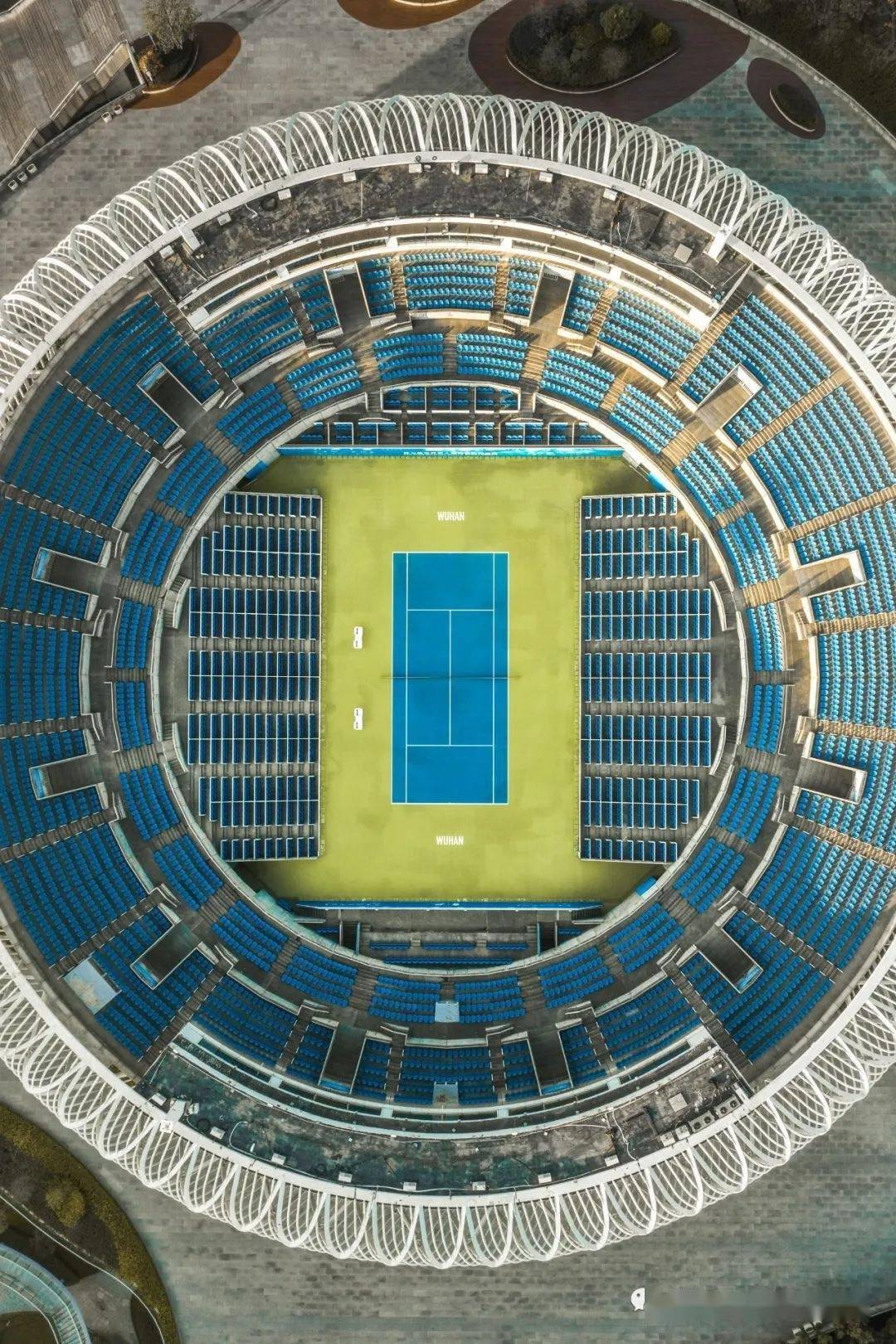 Wuhan Optics Valley International Tennis Center (Wuhan Optics Valley International Tennis Center accommodates how many people)